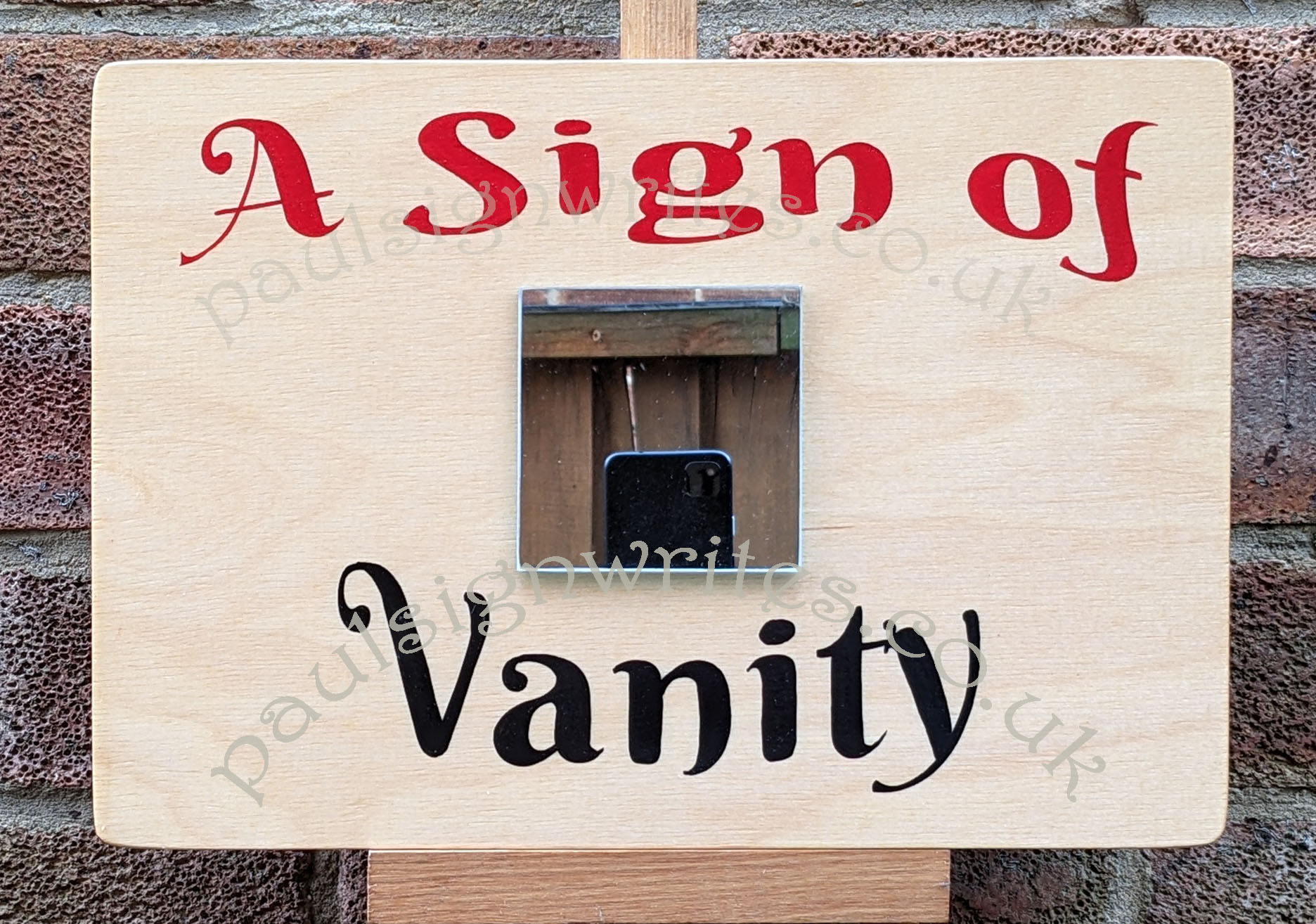 A sign of vanity sign art