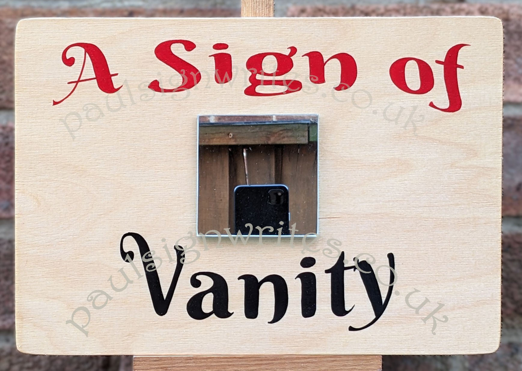 A Sign of Vanity A Sign of Vanity Hand painted sign.