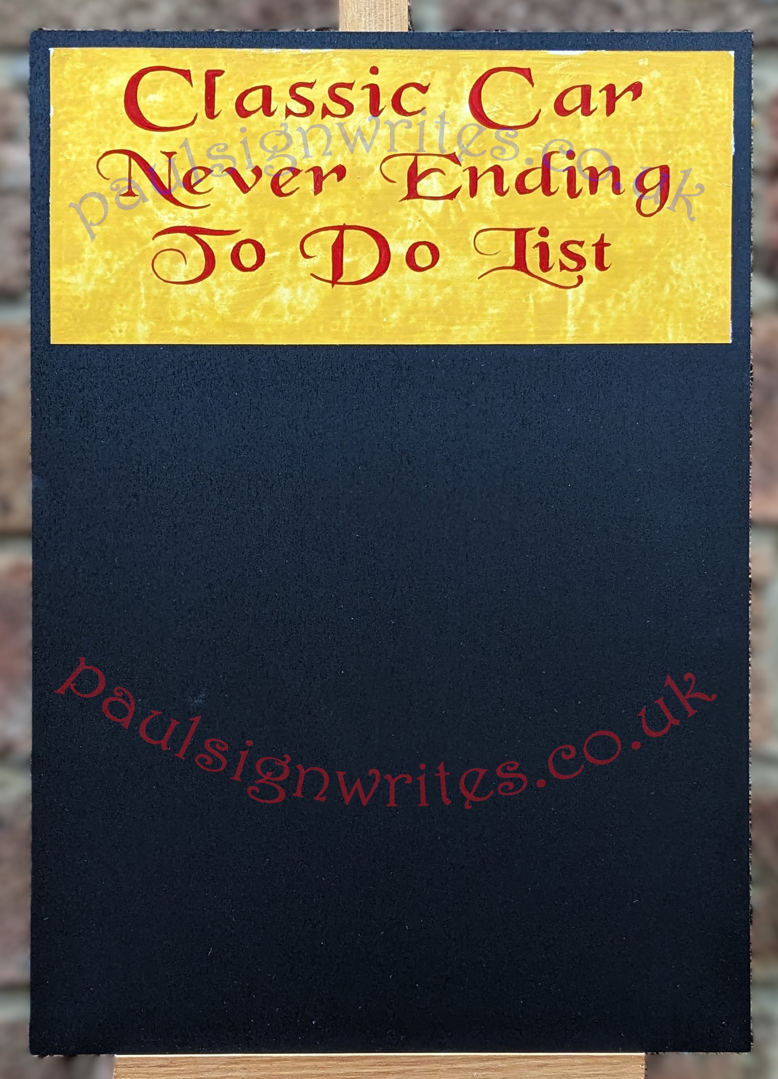 Blackboard Classic Car Never Ending To Do List Blackboard, with signwritten 'Classic Car, Never Ending To Do List' on a yellow painted panel.